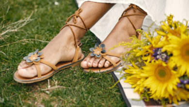 close up of woman hands tying her open summ 2024 12 06 17 39 12 utc